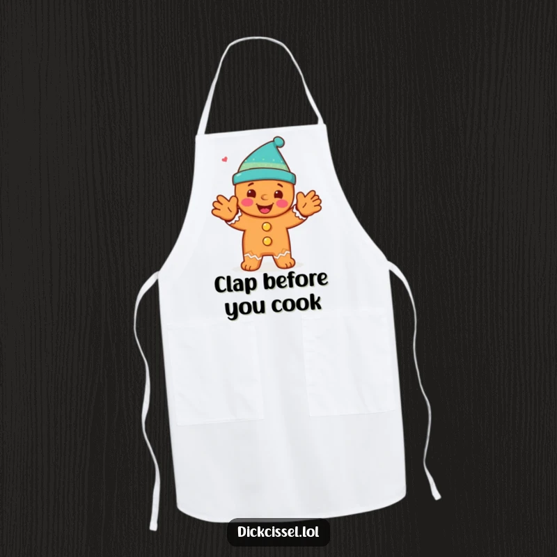 Funny apron with a happy gingerbread man character doing an energetic clap, ideal for festive baking.