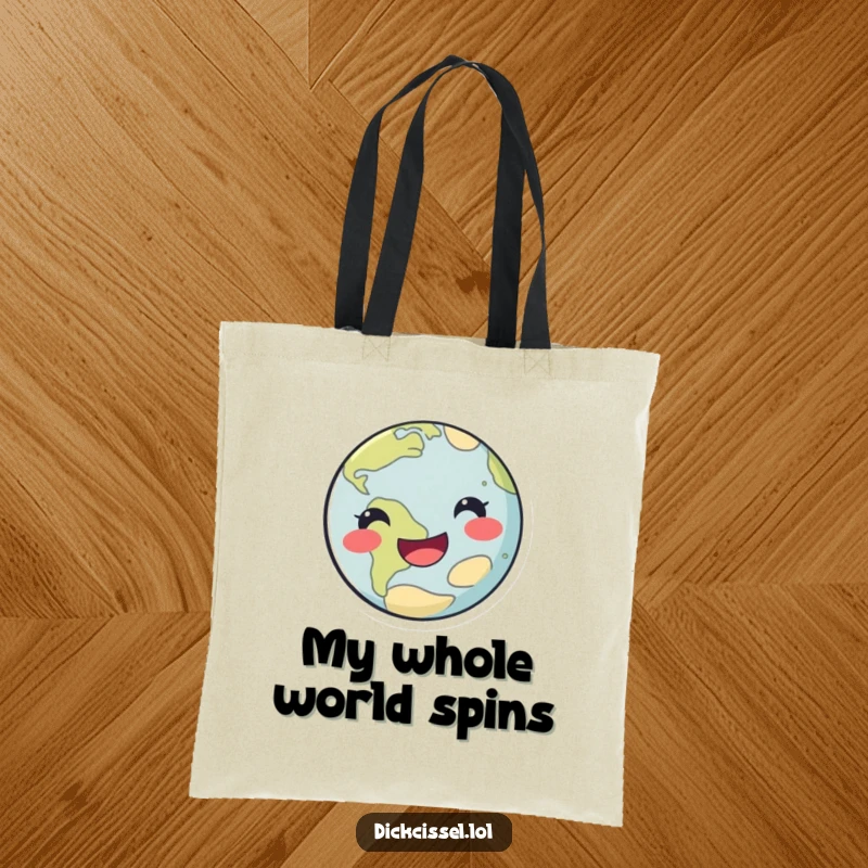 Funny happy planet tote bag featuring a smiling planet in a playful spin, perfect for carrying joy.